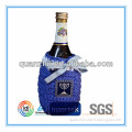 Blue knitted wine bottle cover with branded logo